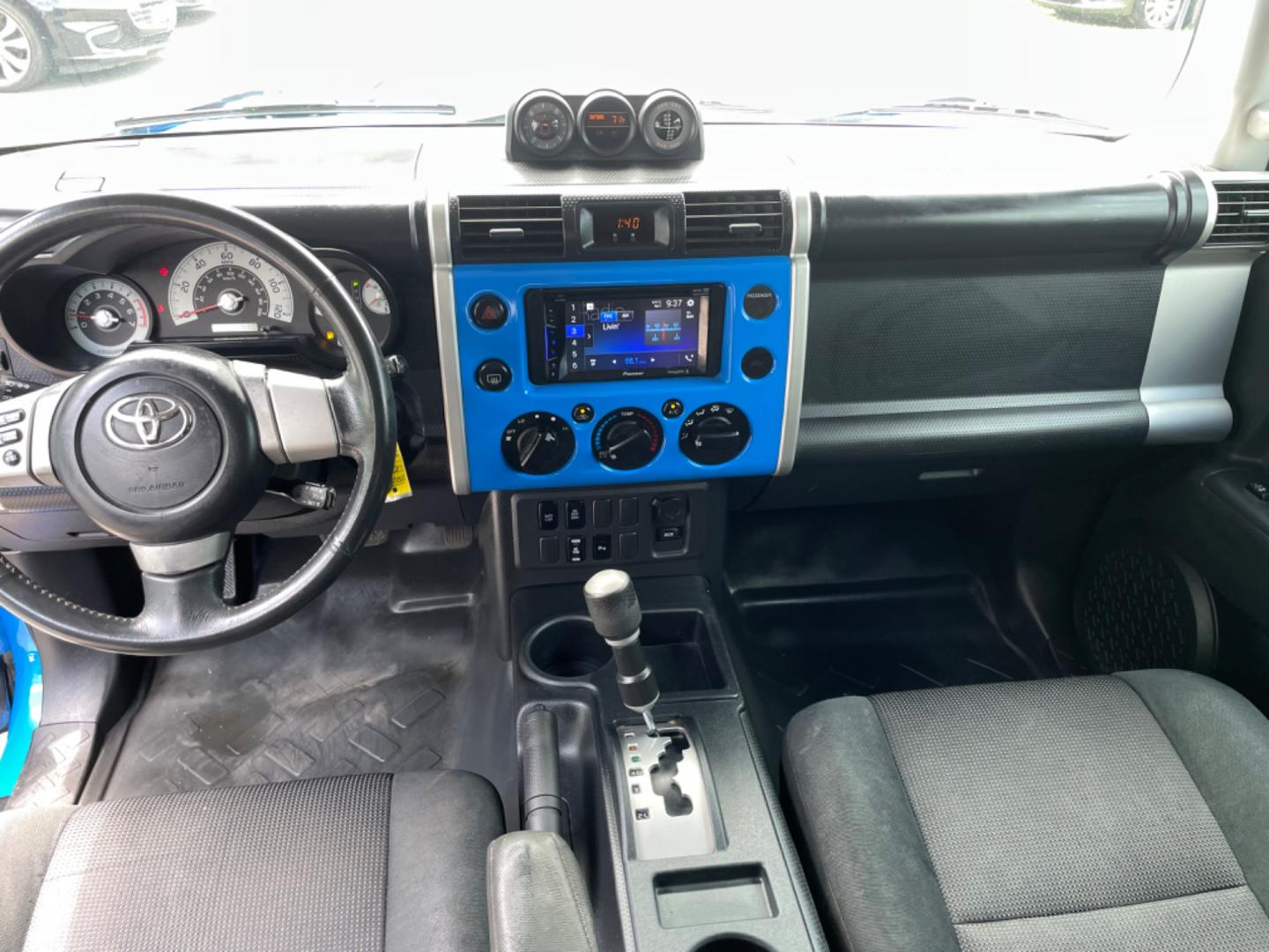 2007 BLUE TOYOTA FJ CRUISER BASE (JTEZU11F970) with an 4.0L engine, Automatic transmission, located at 5103 Dorchester Rd., Charleston, SC, 29418-5607, (843) 767-1122, 36.245171, -115.228050 - Local Trade-in with CD/AUX/Sat/Bluetooth, Power Windows, Power Locks, Power Mirrors, All-weather Flooring, Rear Power Inverter, Keyless Entry, Tow Package. Clean Inside & Out!! 222k miles Located at New Life Auto Sales! 2023 WINNER for Post & Courier's Charleston's Choice Pre-owned Car Dealer AND 2 - Photo#15